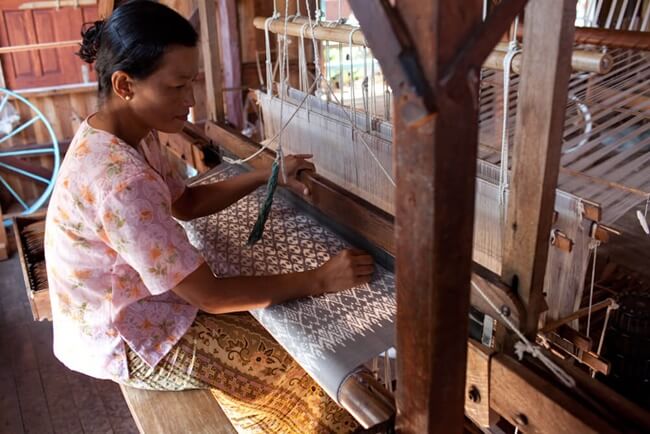 A local woman is weaving at Inn Paw Khon Village